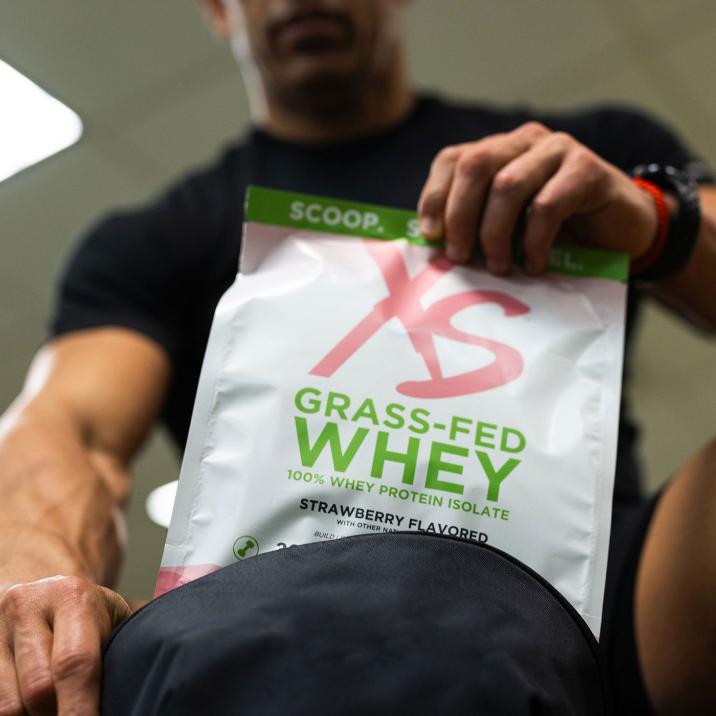 Athlete training with XS Grass-Fed Whey